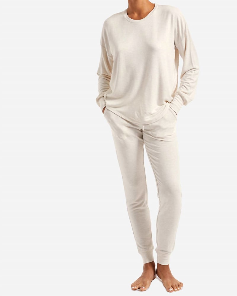 Front of a model wearing a size L Essential Slim Jogger in Oatmeal in Oatmeal by PJ Salvage. | dia_product_style_image_id:338669